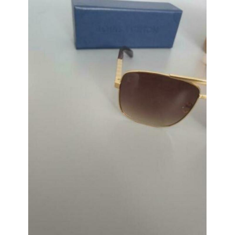 Louis vuitton attitude goud