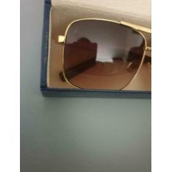 Louis vuitton attitude goud
