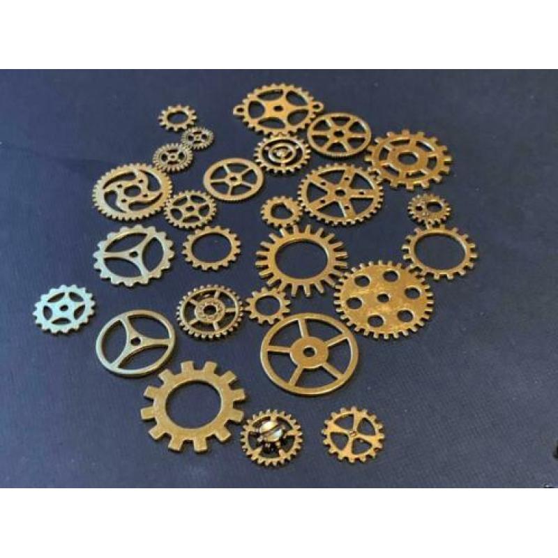 R17a Set van 100 gouden steampunk radertjes € 6,50