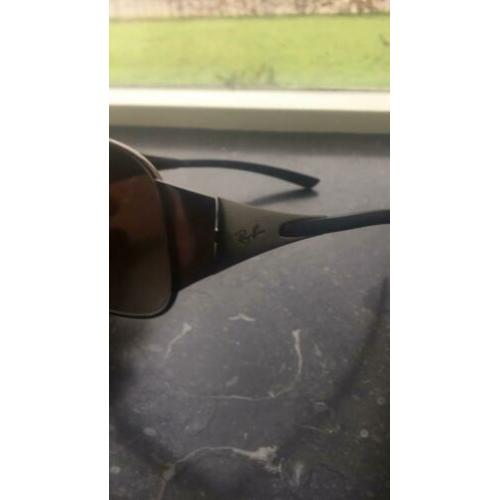 Rayban zonnebril in Nieuwstraat