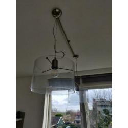 Twee prachtige design hanglampen van glas en staal.