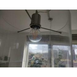 Twee prachtige design hanglampen van glas en staal.