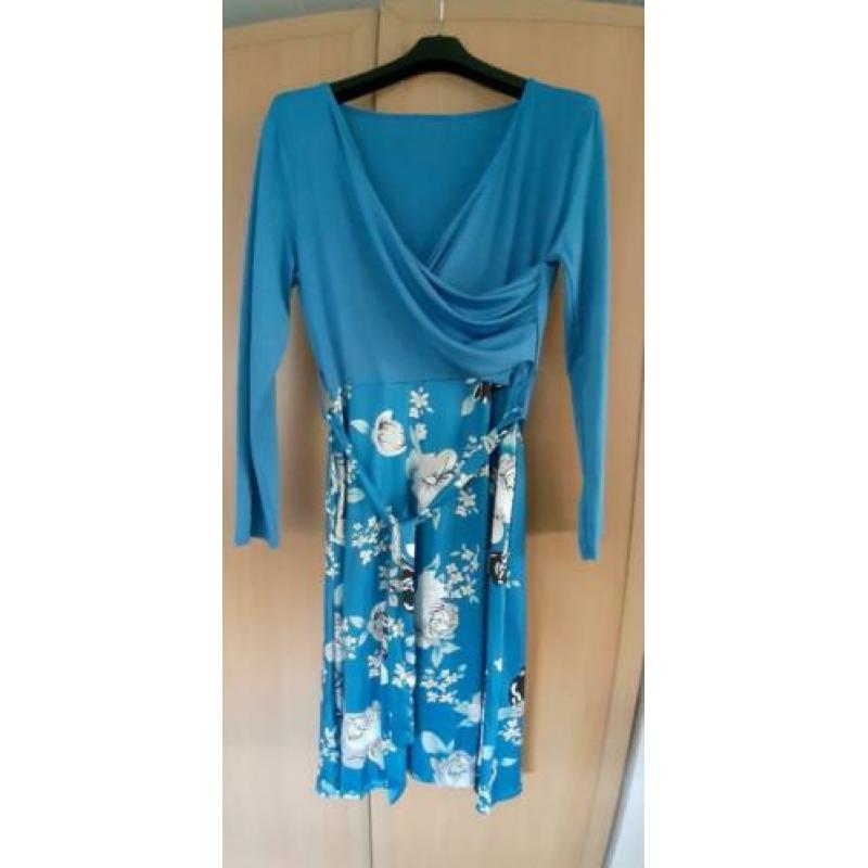 Blauwe tuniek maat 50