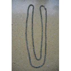 ketting bestaande uit 2 bruinleren + 1 zilverkleurig ketting