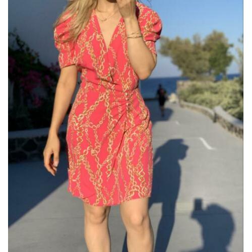 Mooi roze jurkje met print mt36/38 met korte mouwen