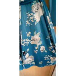 Blauwe tuniek maat 50