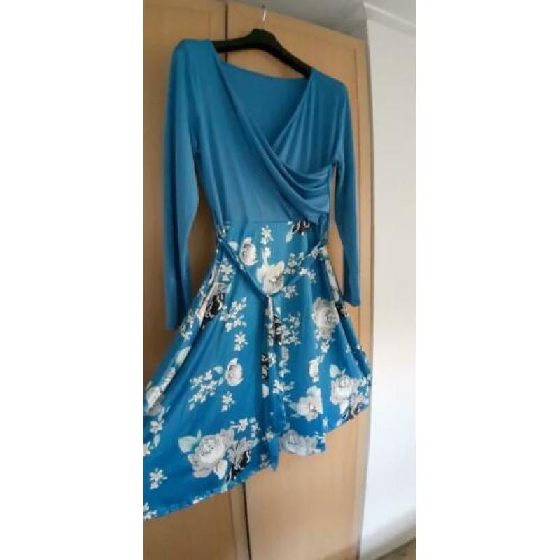 Blauwe tuniek maat 50