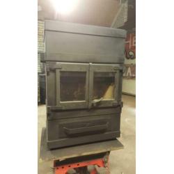 industriële houtkachel 8kw met nieuw glas
