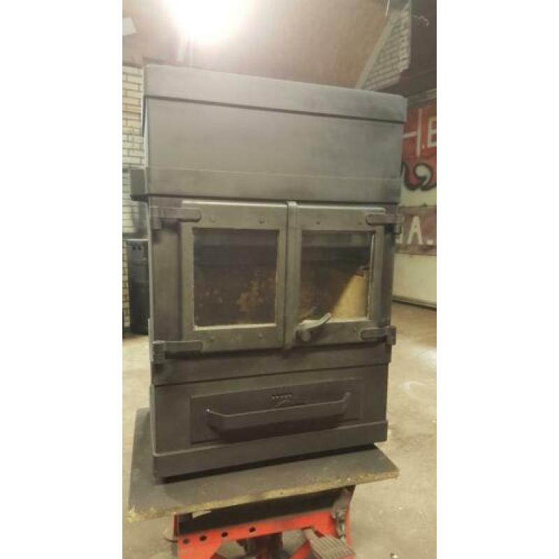 industriële houtkachel 8kw met nieuw glas