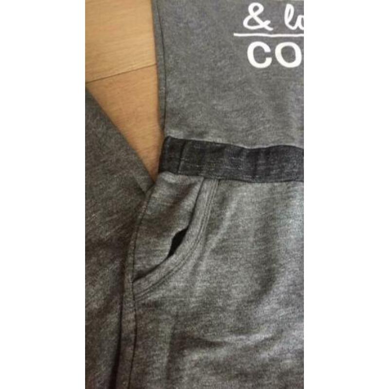 Supergave grijze jumpsuit van sweatstof maat 146/152