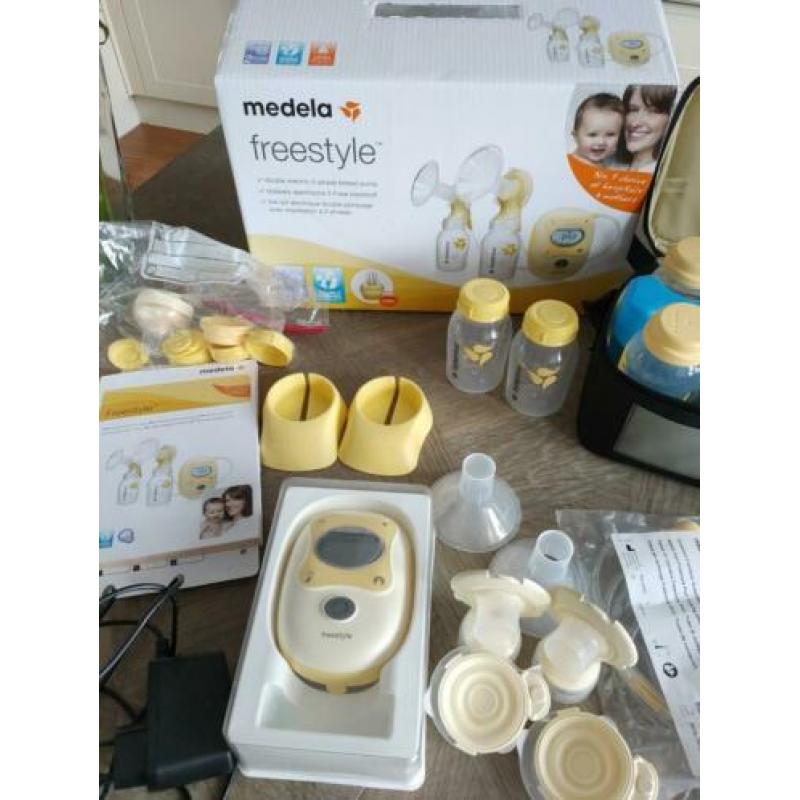 Medela freestyle dubbele kolf Zeer uitgebreid