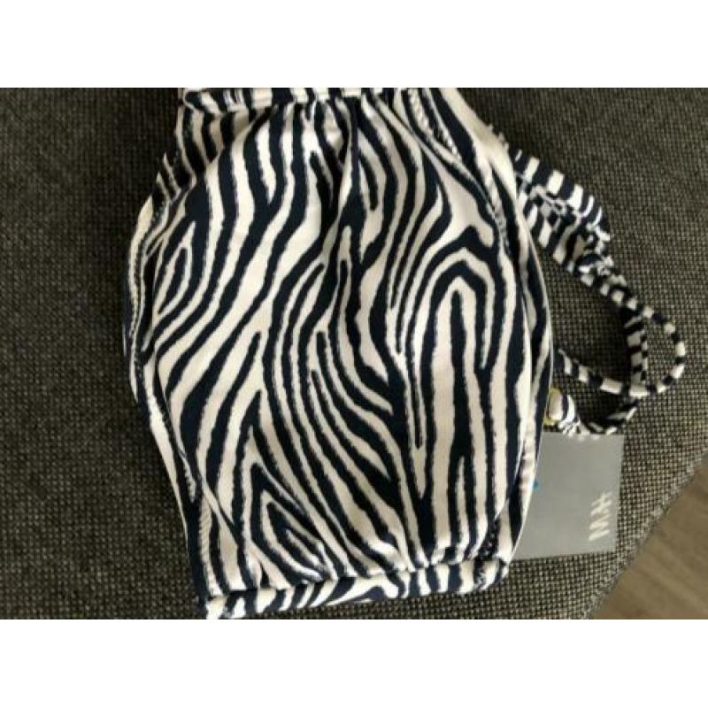 Nieuw bovenstuk vd H&M met kaartje eraan