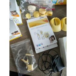 Medela freestyle dubbele kolf Zeer uitgebreid