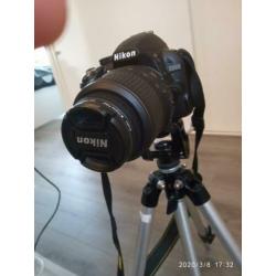 nikon d3100 met lens en andere extras (nooit gebruikt)