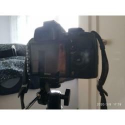 nikon d3100 met lens en andere extras (nooit gebruikt)