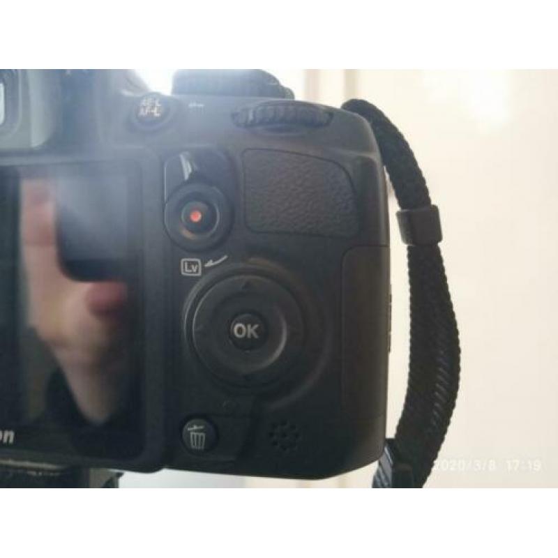 nikon d3100 met lens en andere extras (nooit gebruikt)