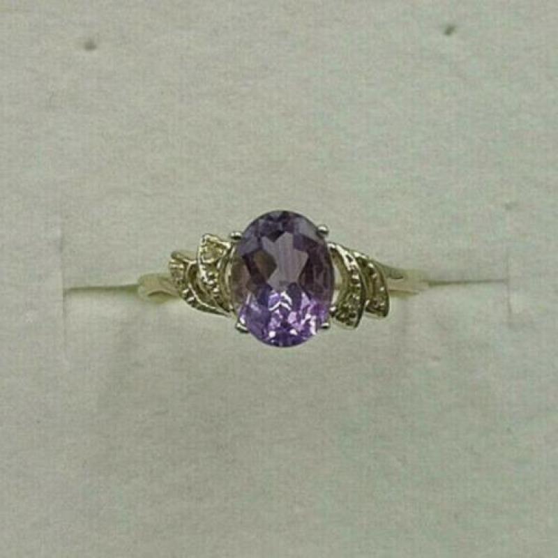 t.k. 9 kt gouden nieuwe damesring amethist met diamant 0,1 c