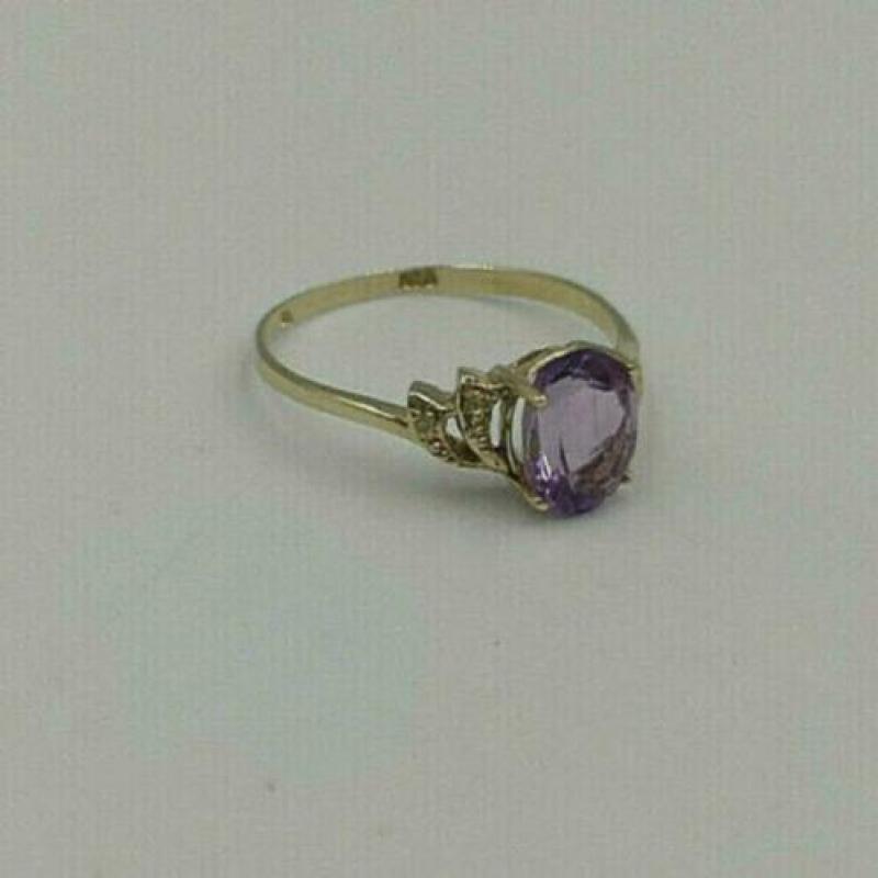 t.k. 9 kt gouden nieuwe damesring amethist met diamant 0,1 c