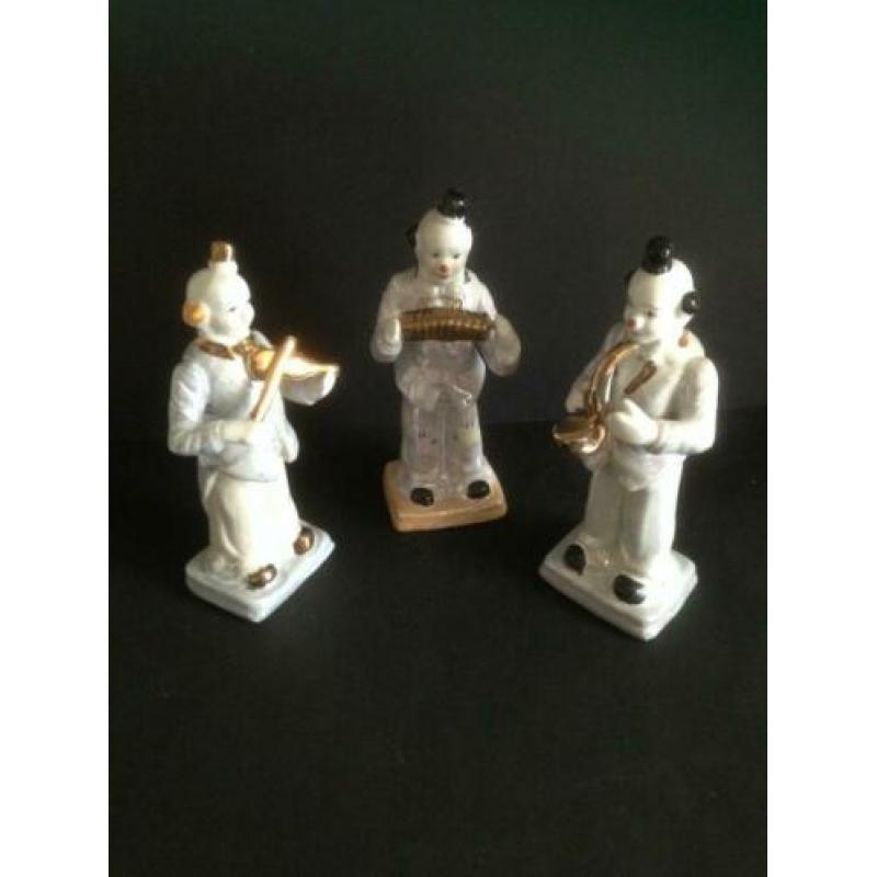 3 Clowns met muziek instrument