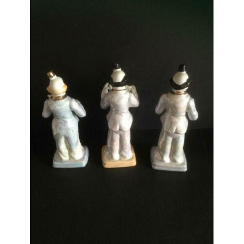 3 Clowns met muziek instrument