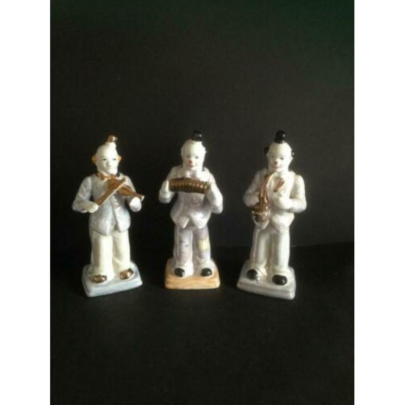 3 Clowns met muziek instrument