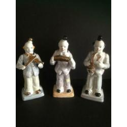 3 Clowns met muziek instrument