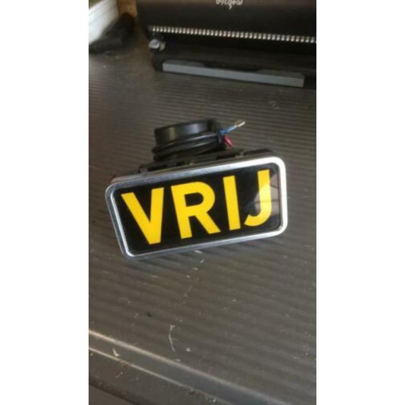 Oud taxi bordje vrij