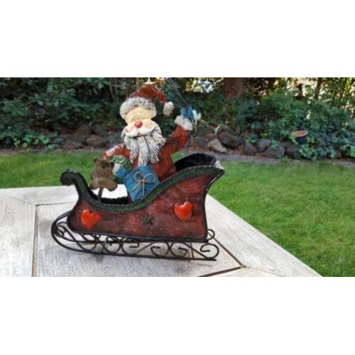Blikken arreslee met kerstman.